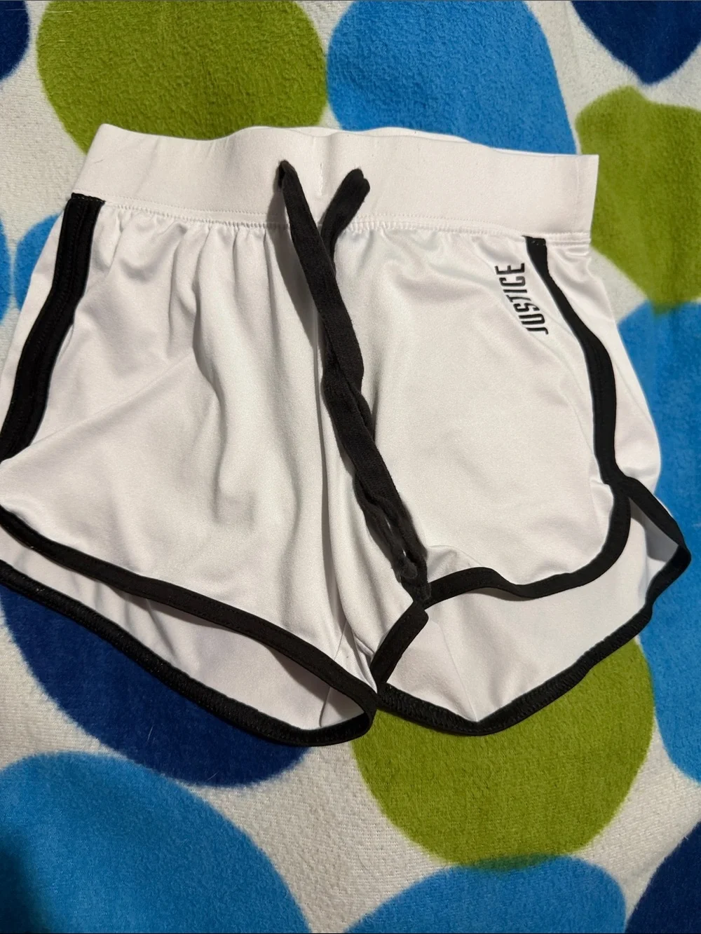Justice White Athletic Shorts with Black Trim